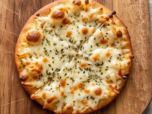 Mini pizza Alho e óleo (pedido minimo de 50,00 total)