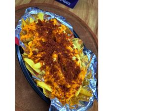 Porção de Batata Com cheddar e Bacon