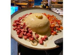 Cuscuz com Calabresa Acebolada