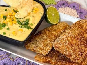 FILÉ DE MERLUZA EMPANADO COM CREME DE MILHO