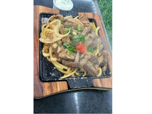 Porção de Contra Filé Aperitivo Acebolado