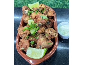 Porção de Frango a Passarinho