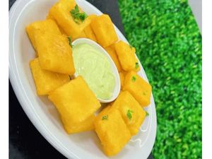 Porção de Mandioca Cremosa