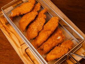 PORÇÃO DE FILE DE TILAPIA EMPANADA 300g