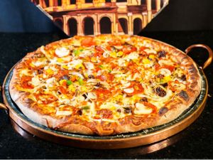 Pizza Familia  + Fruki Guarana 2l